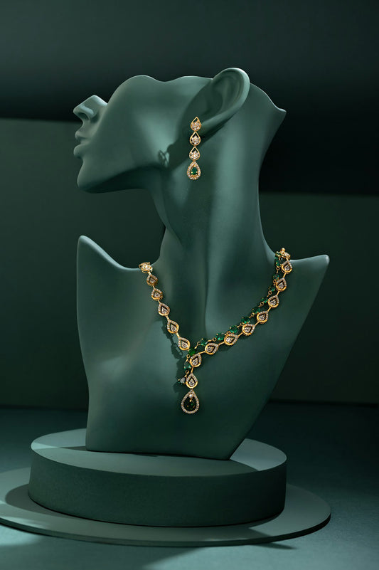 Gold pendant necklace and earring combo set